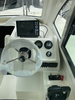 2023 nuevo barco de casco de fibra de vidrio de 27 pies para pescar y relajarse con cabina proveedor