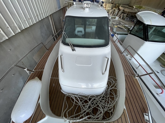 2023 nuevo barco pesquero de fibra de vidrio de 7,6 m para el descanso y la recreación con cabina para el mar proveedor