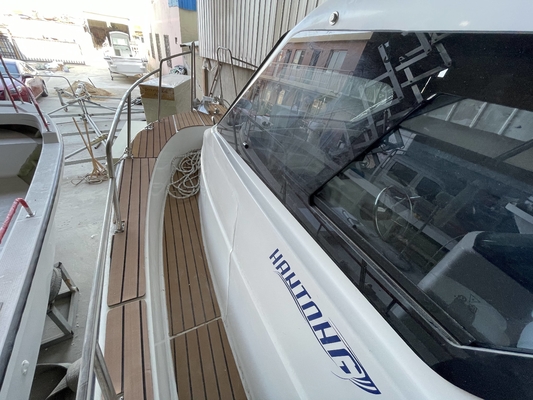 2023 nuevo barco pesquero de fibra de vidrio de 7,6 m para el descanso y la recreación con cabina para el mar proveedor